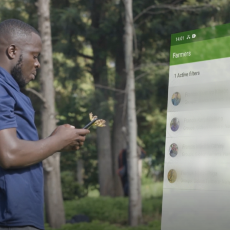 Farmforce Man using the Farmforce software, in the field.